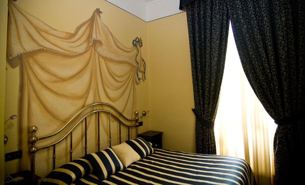 Hotel Regina Пінероло Номер фото